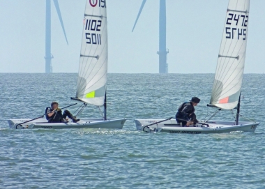 Brian Allen takes the lead in his RS Aero and wins the race overall