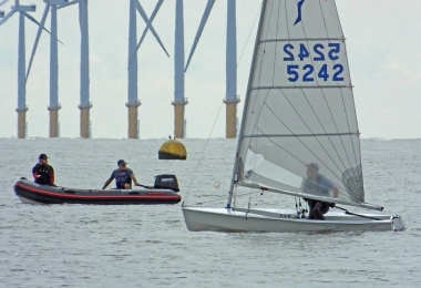 The Club Rescue Boat looks on as Michael Gutteridge heads his Solo to the Kingscliff mark