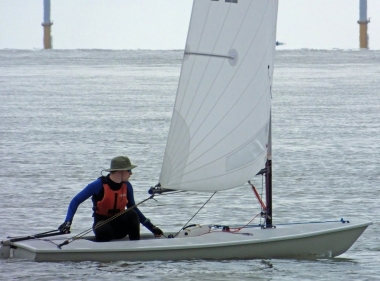 Finley Taylor, just behind Paul Stanton, wins the Cadet Single Helm in his Laser