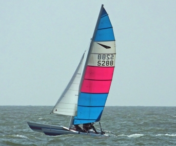 The Dart 18 of Tim Dye and Paul Stanton just cuts through the fleet