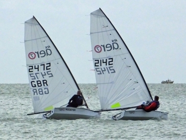 Ken Potts, windward of Brian Allen as they reach towards the first mark
