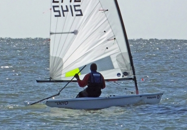Ken Potts studies his sail as he heads to the St. Michael's buoy