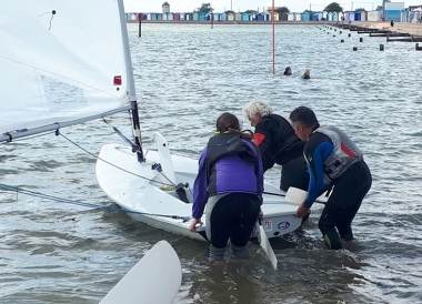 And about to take to the water in his Laser