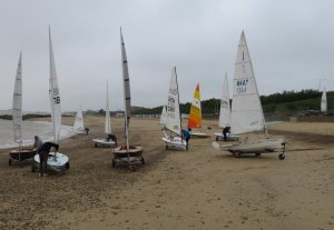 The dinghies get rigged on the beach