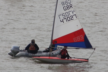 Finlay enjoying getting afloat in a Topper