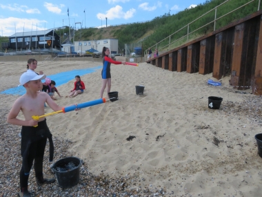 George and Via busy filling their buckets