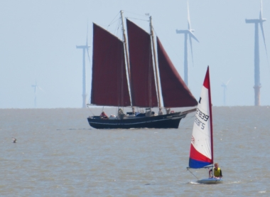 Korben in his Topper with a schooner behind