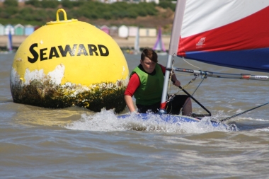 Alfie goes round the Seaward mark in his Topper