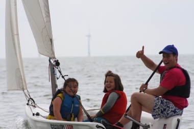 Harry, the Club's Cadet Officer, takes some Otters out for a sail