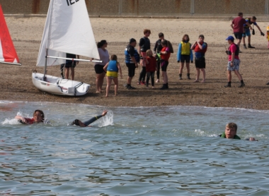 The start of the triathlon and the swimmers get underway