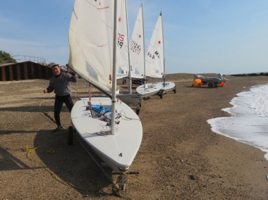 Jubilee Cup winner Ken Potts busy rigging his Laser prior to the start of the race