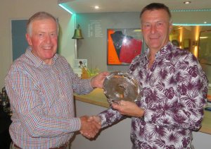John Tappenden is presented with the Bill Geddes Trophy from Chairman of Directors Malcolm Jolly
