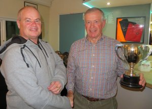 The Club's oldest trophy - The Tee Dee Cup - is presented to Paul Stanton