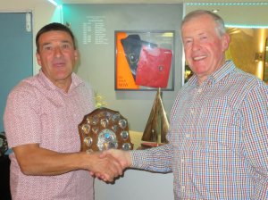 Gunfleet's 2021 Senior Helm - Ken Potts receives the trophy from Chairman of the Directors Malcolm Jolly