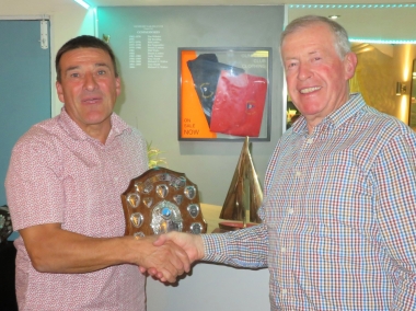 Gunfleet's 2021 Senior Helm - Ken Potts receives the trophy from Chairman of the Directors Malcolm Jolly