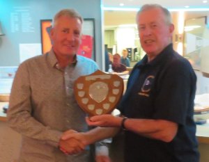 Malcolm Jolly presents the Tarrant Trophy to Brian Allen