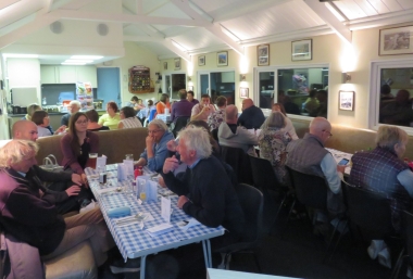 Members begin to arrive at the Laying-Up Supper