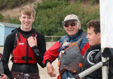 Cadet Rear Commodore Tom and Cadet Commodore Harry chat to senior sailor Eddie about tactics