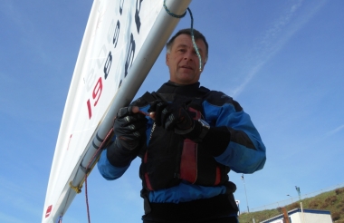 Gunfleet's winning helmsman John Tappenden rigging his Laser dinghy before the start of the race for the March Hare Trophy