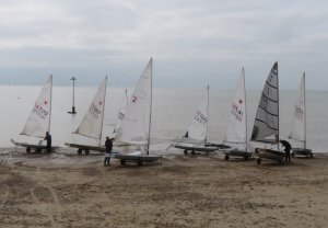 The competitors rig-up on the beach