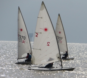 A trio of Lasers during the race