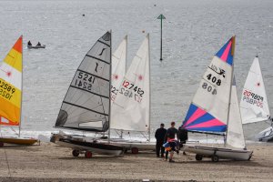 Boats on the beach ready to take part in the Ken Potts Pursuit race