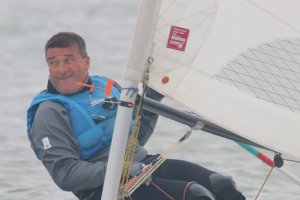 Ken drives his Laser to victory in the RNLI race