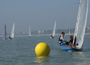 The Fireball arrives at the first mark, the Kingscliff buoy, ahead of the other competitors