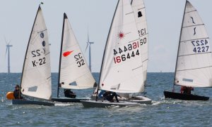 At the head of the fleet, a tight bunched group of dinghies get off to a cracking start in the fifth race of the Spring Series