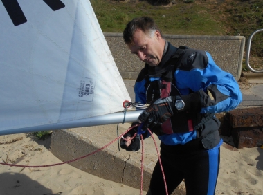 Winner of the first race in the Gunfleet's Spring Series, John Tappenden, preparing his Laser