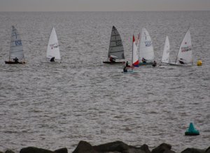As the fleet rounds the Eastcliff buoy they remain tightly bunched