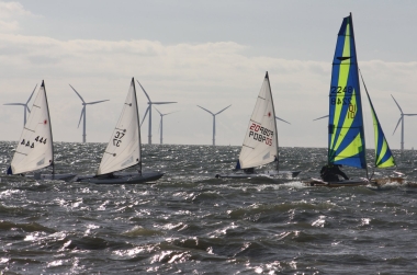 Robert Mitchell and Brian Allen fly past the Lasers in their Dart 16