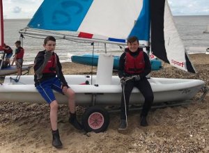 Cadet member Alfie (right) takes a friend out sailing as part of SOS