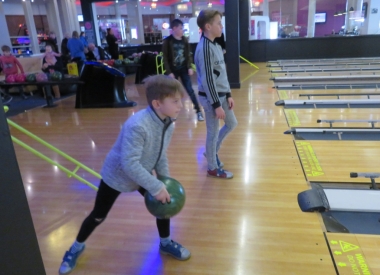 George about to "put one down" whilst brother Harrison ponders on his result