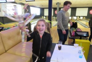 There's more to bowling, it's called collecting all the gift tickets - and guess who doesn't miss a trick!