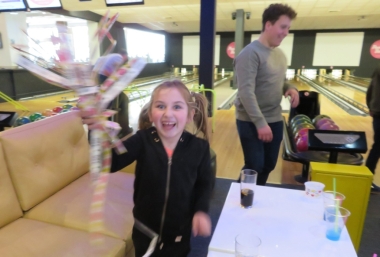 There's more to bowling, it's called collecting all the gift tickets - and guess who doesn't miss a trick!