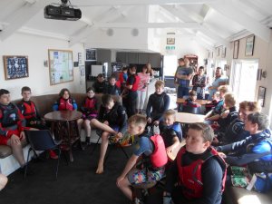 Some of the Cadets and Otters gather in the Clubhouse prior to an SOS briefing