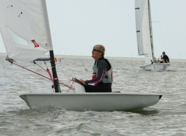 Concentrating on getting maximum lift, Yvonne Gough in her Laser