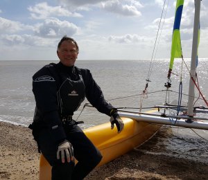 Robert Mitchell, who came within a boat length of winning The Chase, and his Dart 16 catamaran