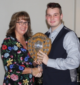 Junior Leading Helm Michael Gutteridge receives the Spirit of the Wind Shield