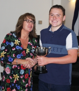 Alfie Searles is presented with the Cissbury Trophy