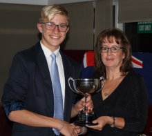 Rear Commodore Helen Swinbourne presents the Cissbury Trophy to Cadet Thomas Aiken for his active help at the Club in 2019