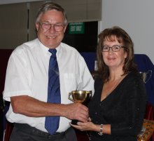 John Robertson is awarded the Gentlemen's Merit Trophy for his full-year role of senior helm on the Club's Safety Boat