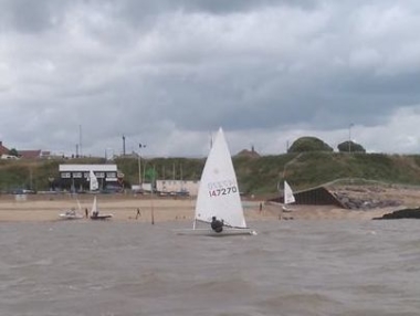 Under dark skies, Ken Potts finishes the race to take second place