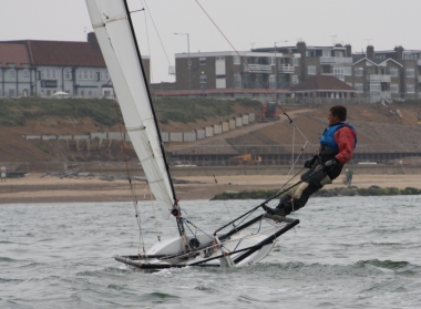 Having to content himself with second place is Ken Potts, trapezing on the wings of his RS600