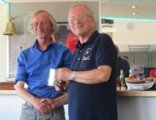 Collecting the Tim Webster Trophy for winning Comet - Peter Downer