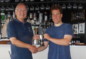 A meeting of Commodores - Cadet Commodore Harry Swinbourne is presented with the Cadet Day Trophy by Gunfleet's Commodore Richard Walker