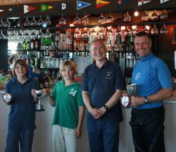 RNLI Trophy winners John Tappenden (right) and Conor & Finlay Williams (left) with Club Commodore Richard Walker