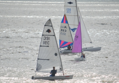 Boats jostle for position as the start time draws near