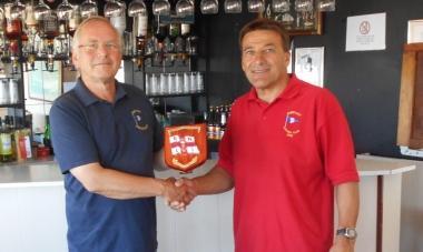 Gunfleet Commodore Richard Walker presents the RNLI Shield to Ken Potts